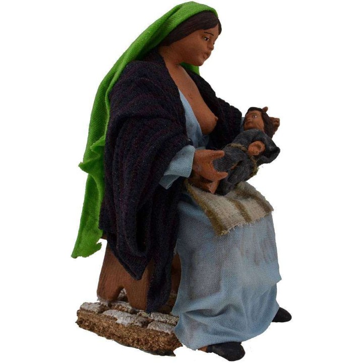 Woman nursing her baby 16 cm
