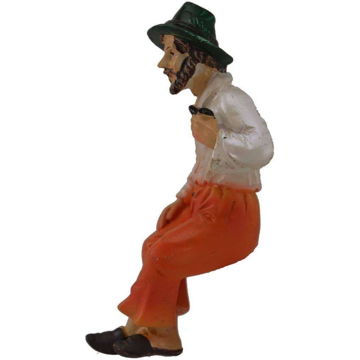 9 cm Hombre sentado en resina