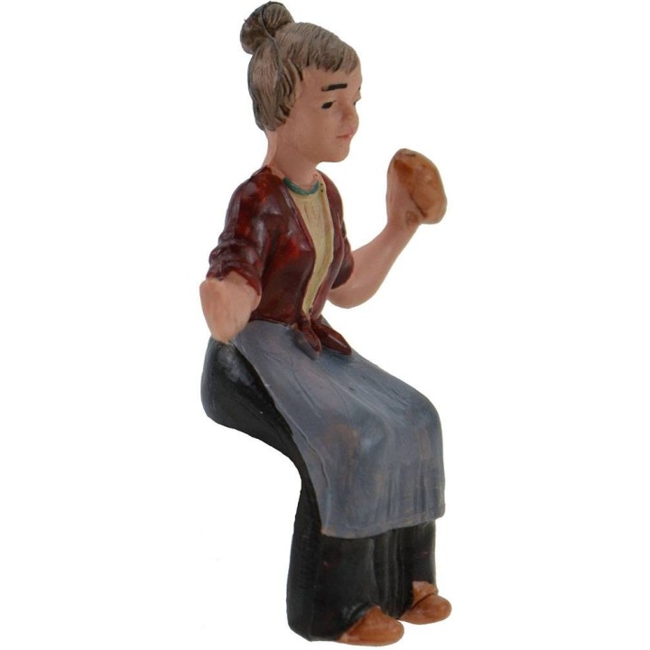 Donna seduta con pane 7 cm