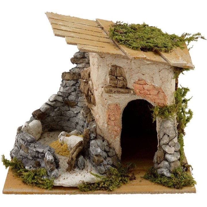 House with sheep cm 23x17x17 h.