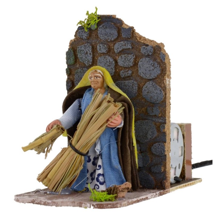 Campesino oriental con haces de paja serie 8 cm en movimiento