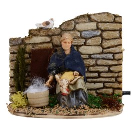 Donna che spenna in movimento serie 10 cm Landi