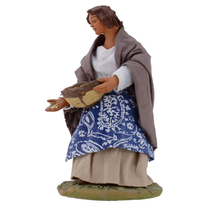 Donna seduta con cesto serie 15-16 cm