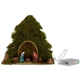 Tree with hut and Nativity illuminated with piled with