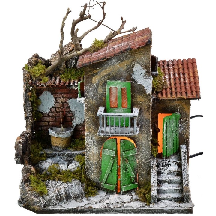 Casa illuminata con fontana funzionante cm 30x21x35 h