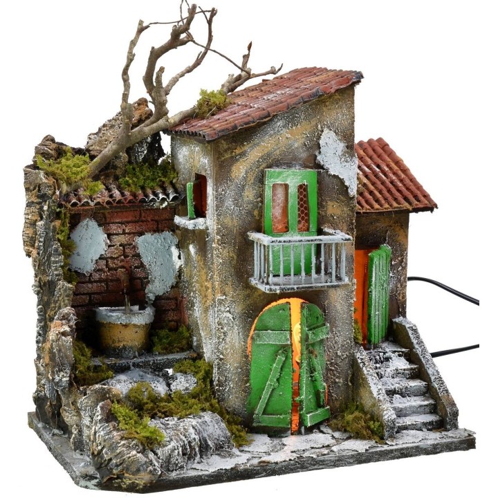 Illuminated house with functioning fountain cm 30x21x35 h