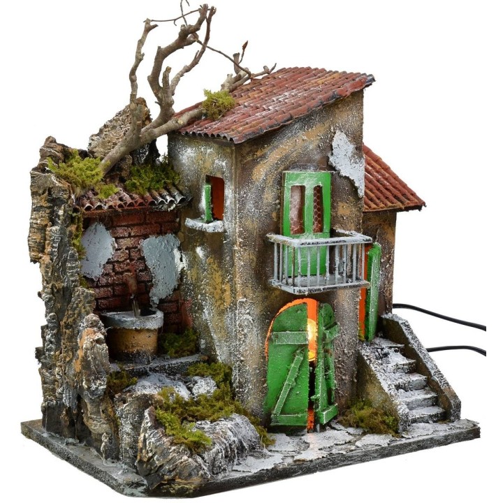 Illuminated house with functioning fountain cm 30x21x35 h
