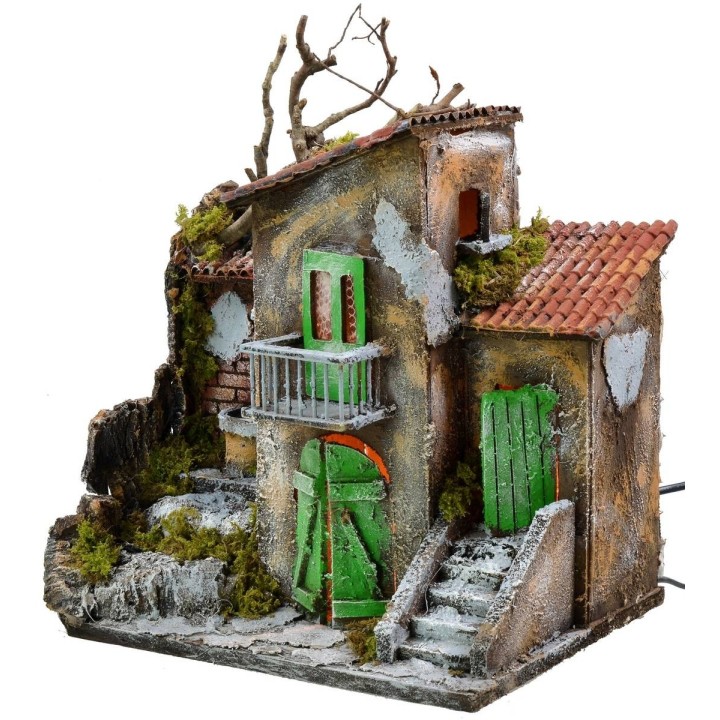 Casa iluminada con fuente funcionando de 30x21x35 cm h