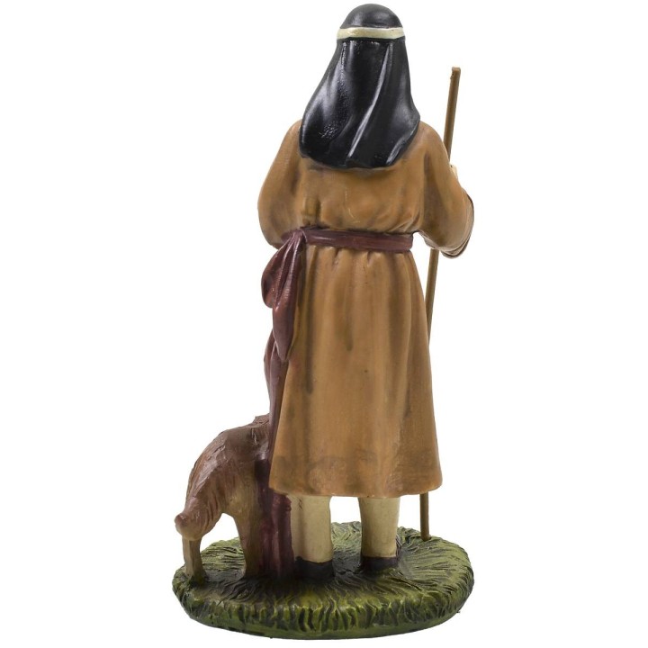 Pastor oriental con perro en resina pintada 12 cm serie