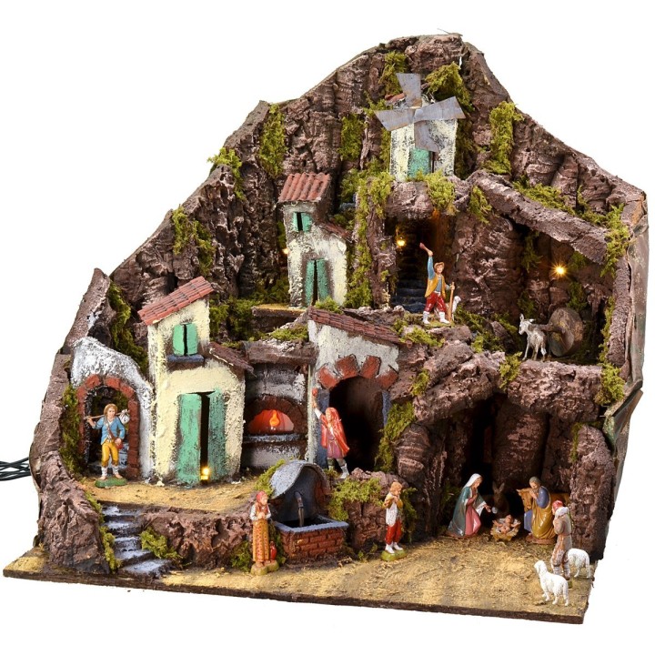 Presepe illuminato completo di statue Landi con fontana, fuoco