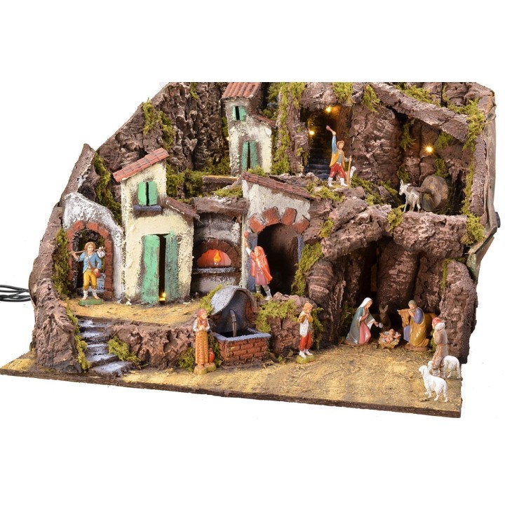 Illuminated nativity scene complete with Landi statues with