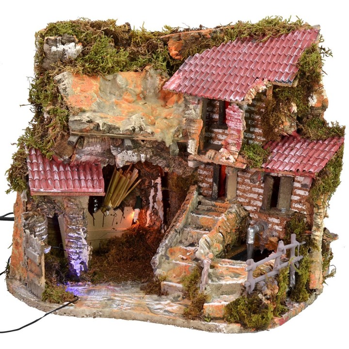 Illuminated nativity scene with functioning fountain and