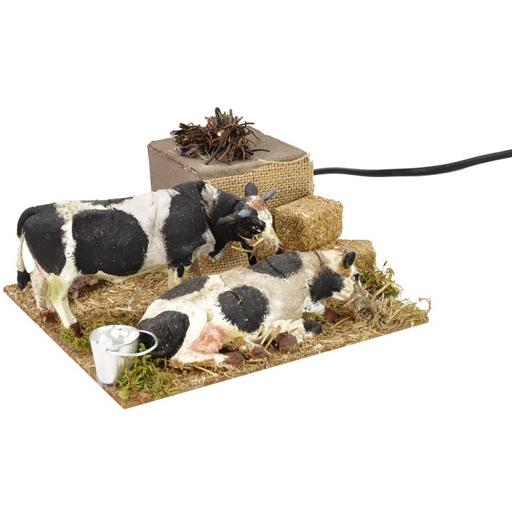 Mucche in movimento che mangiano cm 15x15x7 h