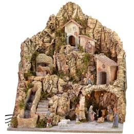Pesebre iluminado con asno en el molino completo