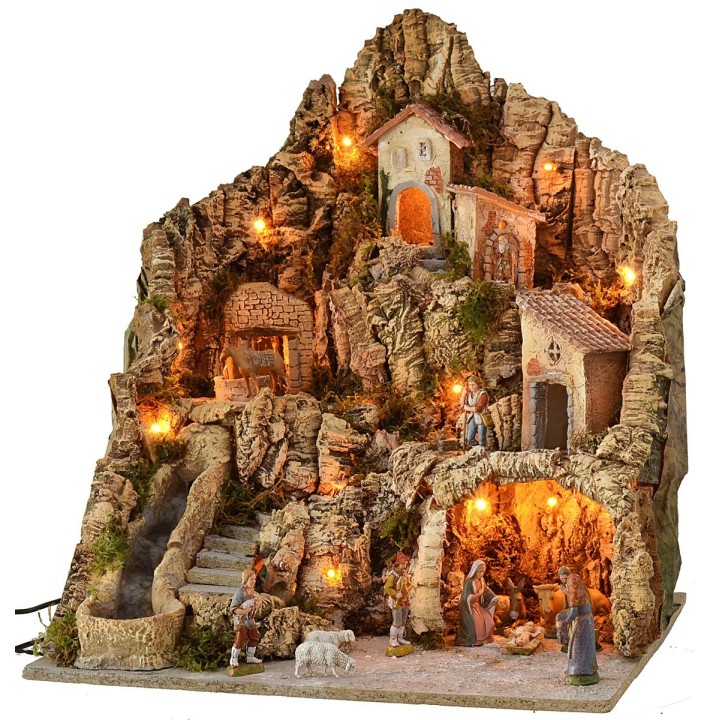 Pesebre iluminado con asno en el molino completo