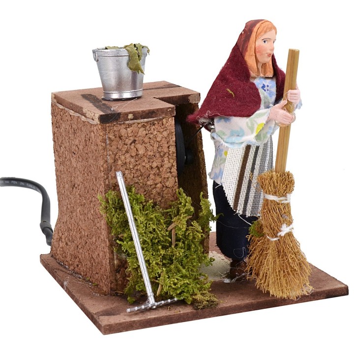 Palestinian woman with broom in motion 12 cm