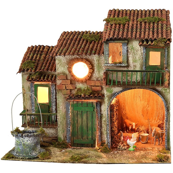 Casita de campo iluminada a corriente con animales y pozo cm