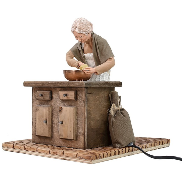 Mujer popular que amasa en movimiento 30 cm