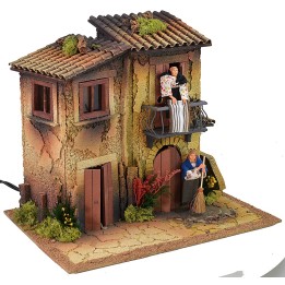Pueblo iluminado para belén con doble movimiento de 40x30x35 cm