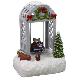 Escenario navideño con niños en el columpio funcionando a
