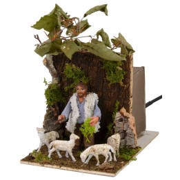Shepherd on the move with sheep 11x17x17 h