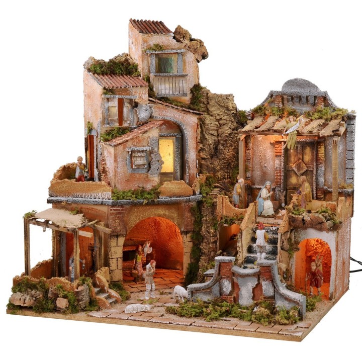 Presepe illuminato con cascata funzionante completo di statue