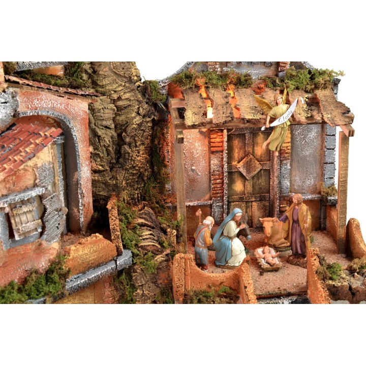 Presepe illuminato con cascata funzionante completo di statue