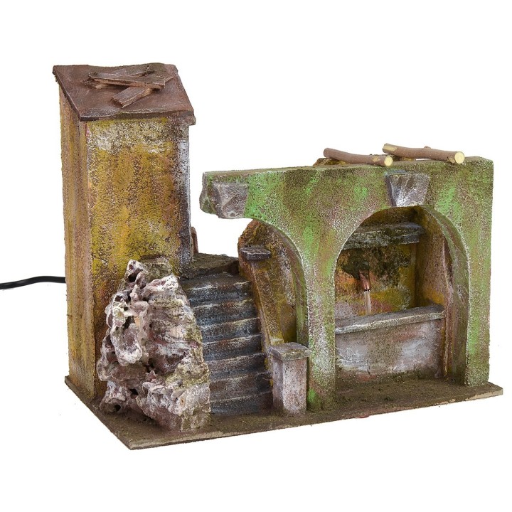 Porzione di casa con fontana funzionante e archi per presepe cm