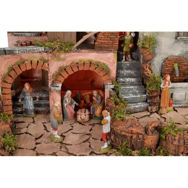 Presepe illuminato con fontana funzionante completo di statue