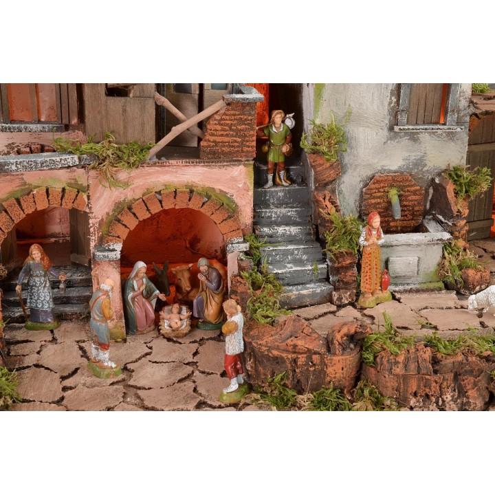Presepe illuminato con fontana funzionante completo di statue