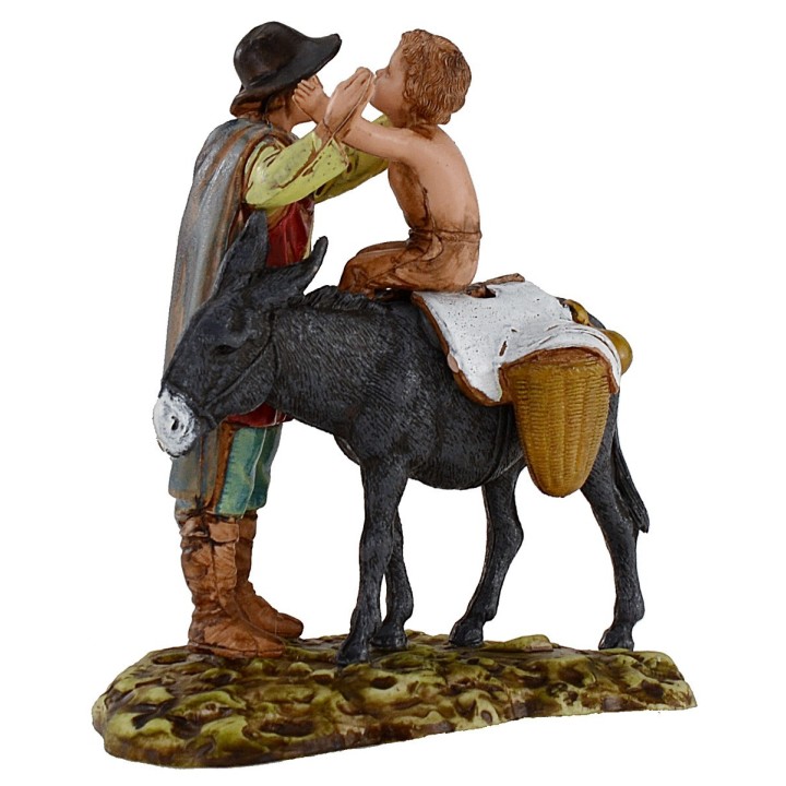 Hombre de pie y niño sobre burro 10 cm Landi Moranduzzo