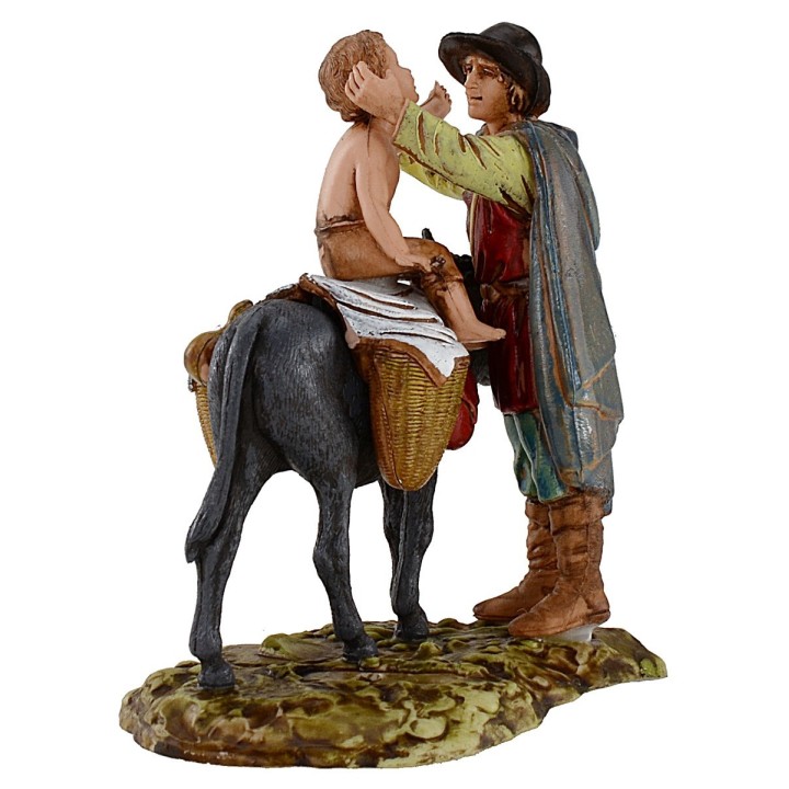 Hombre de pie y niño sobre burro 10 cm Landi Moranduzzo