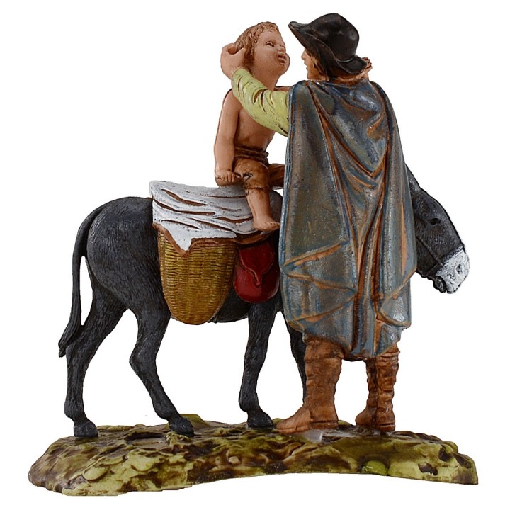 Hombre de pie y niño sobre burro 10 cm Landi Moranduzzo