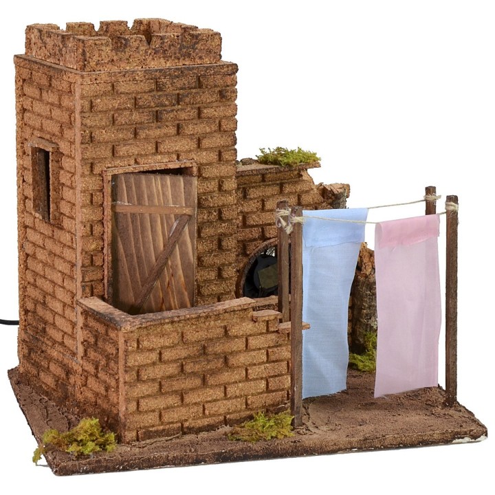 Casa con panni stesi effetto vento cm 27x19x24,5 h.