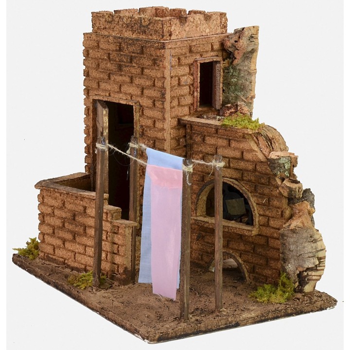 Casa con panni stesi effetto vento cm 27x19x24,5 h.