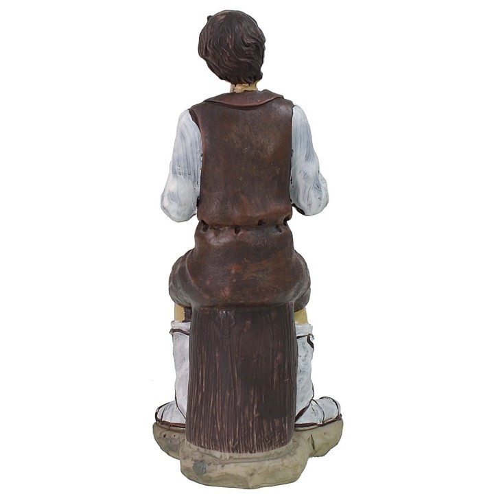 Hombre sentado con la sandía de resina serie 25 cm
