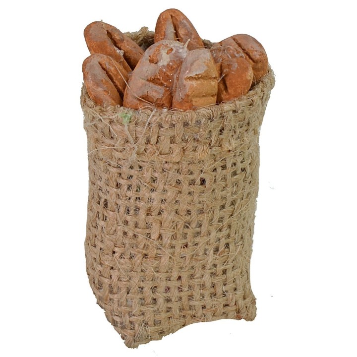Saco de yute con pan de 6 cm de altura.