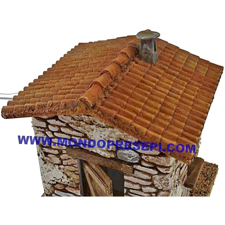 Casa in pietra con fumo cm 15x12x19 h.