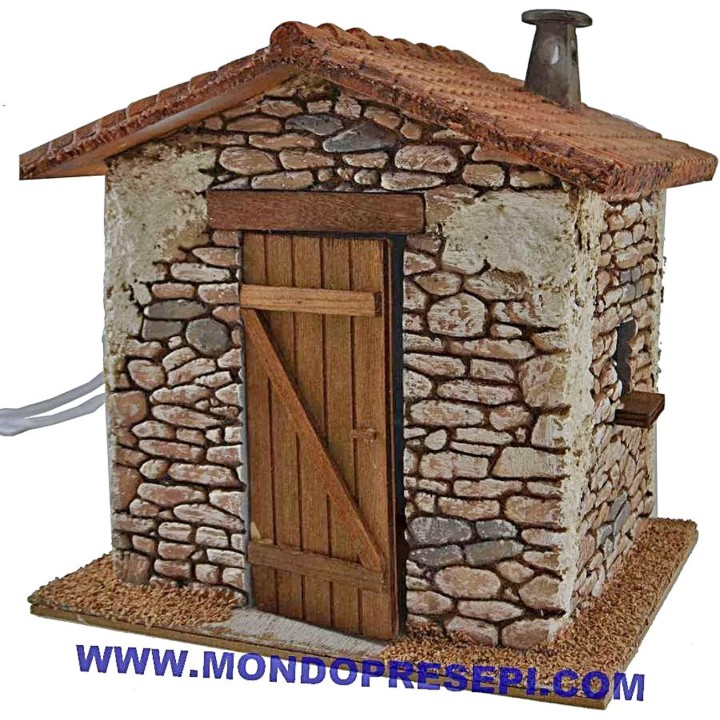 Casa in pietra con fumo cm 25x22x24 h.