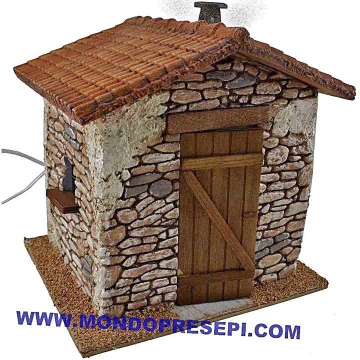 Casa in pietra con fumo cm 25x22x24 h.