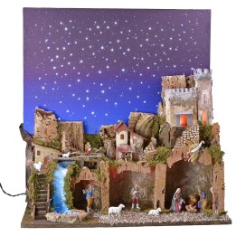 Illuminated nativity scene with a starry sky made of fiber