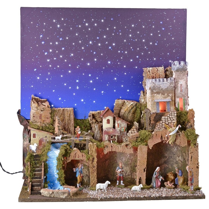 Pesebre iluminado con cielo estrellado de fibras ópticas