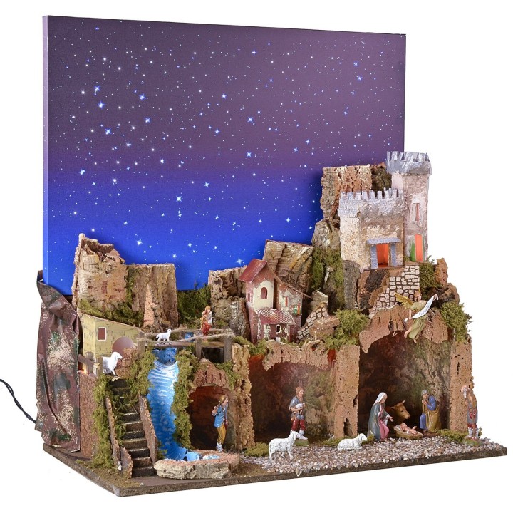 Illuminated nativity scene with a starry sky made of fiber