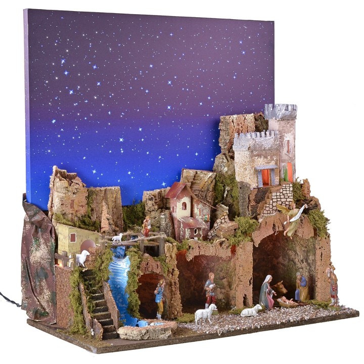 Illuminated nativity scene with a starry sky made of fiber