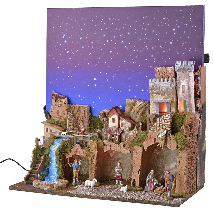 Pesebre iluminado con cielo estrellado de fibras ópticas