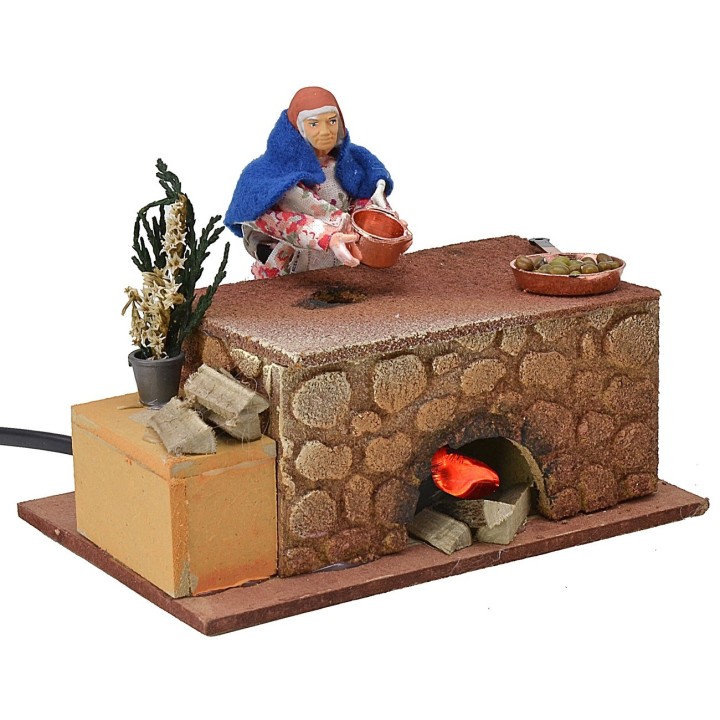 Mujer cocinando en movimiento 16x10x12 h