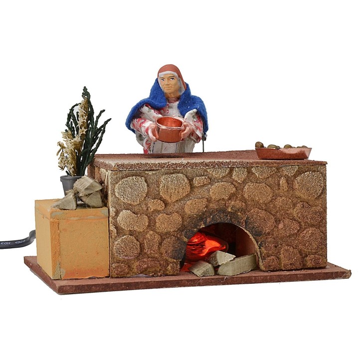 Mujer cocinando en movimiento 16x10x12 h