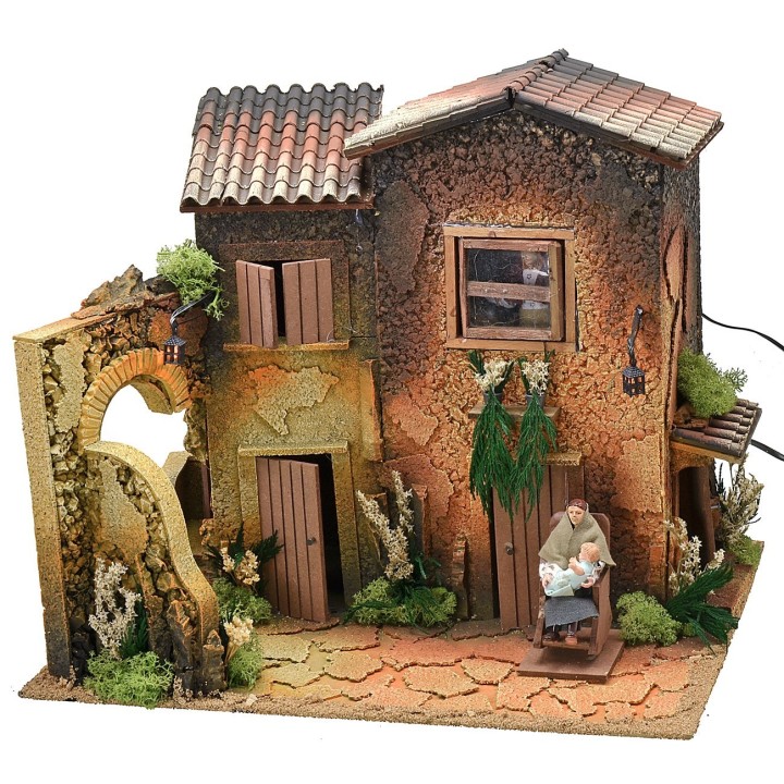 Borgo illuminato con due donne 12 cm in movimento cm 45x35x40 h