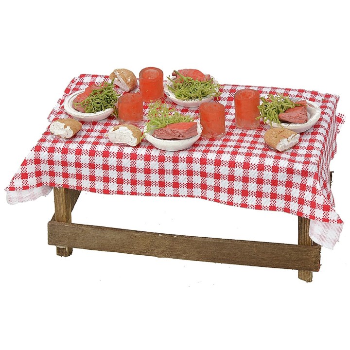 Mesa de madera con mantel y platos cm 13x6,5x5 h