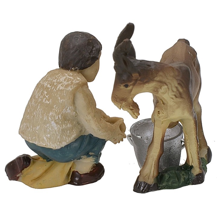 Joven ordeñador de cabra en resina serie 9 cm